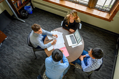Grad students around table